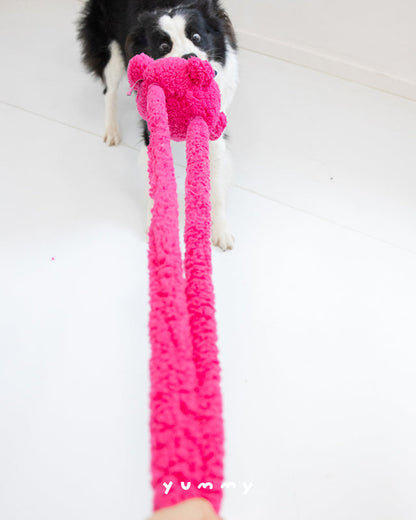 SoftPals Floppy Tug plush dog toy front view in pink with long tug legs