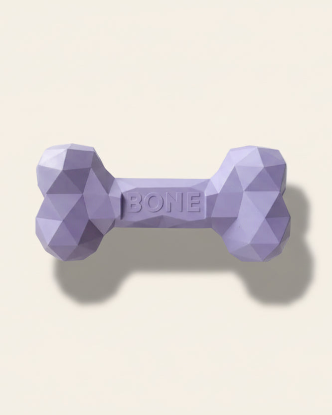 ChewFlex Diamond Bone dog chew toy in purple color, textured surface design