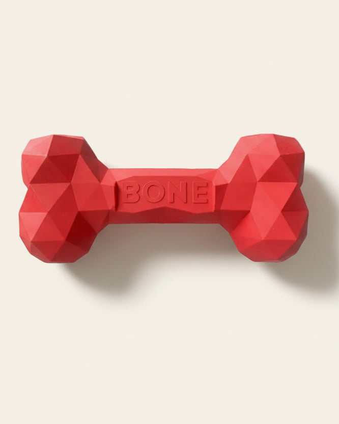 ChewFlex Diamond Bone dog chew toy in red color, textured surface design
