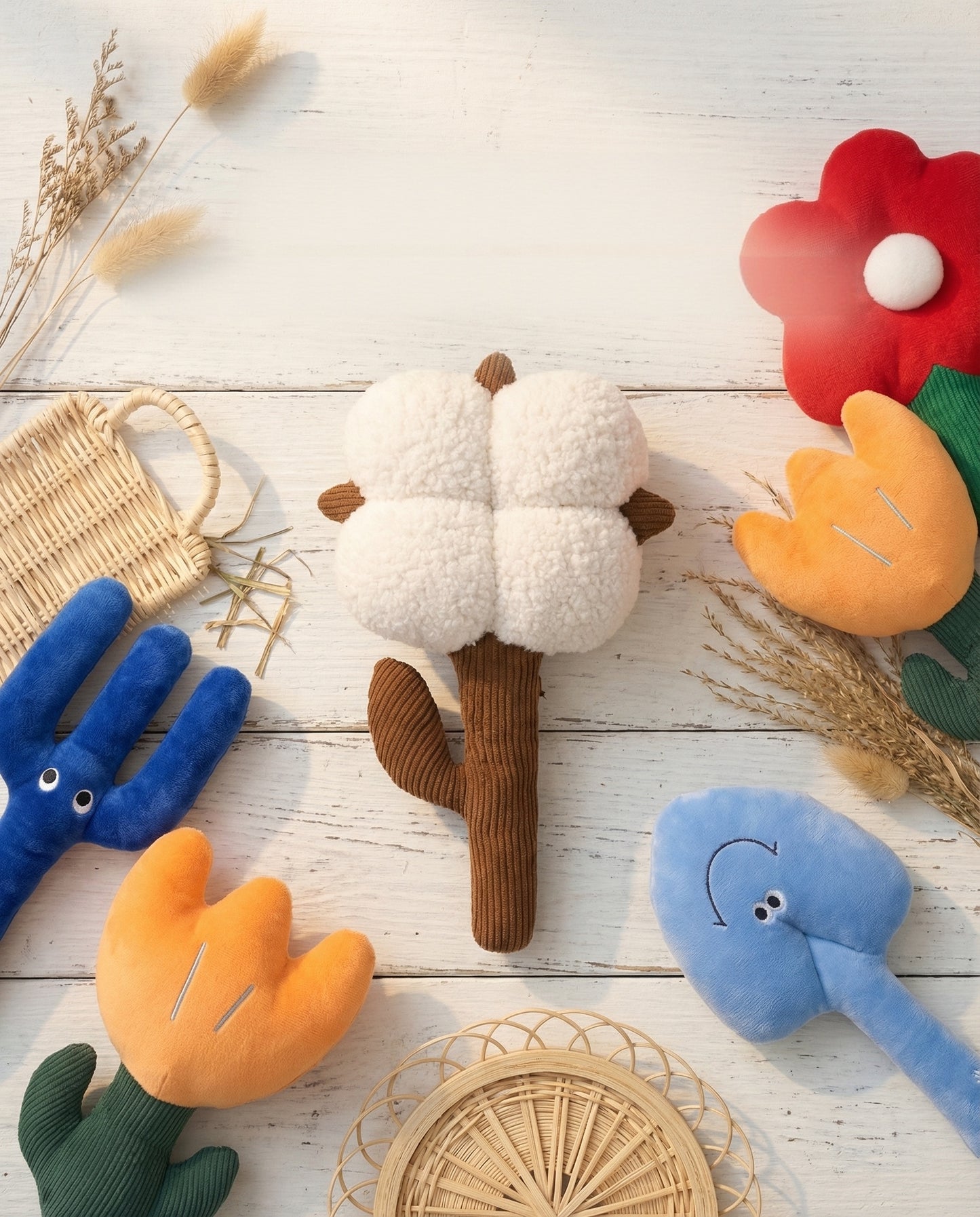 SoftPals Garden Buddy garden-inspired plush squeaky toys shown in a styled flat lay