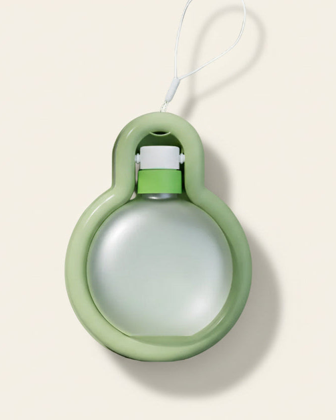 Trailblaze Hydration Hub portable pet water bottle in sage green, product view
