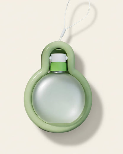 Trailblaze Hydration Hub portable pet water bottle in sage green, product view
