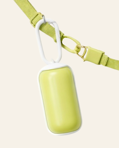 Trailblaze Waste Capsule clipped onto a leash strap for easy carrying on walks