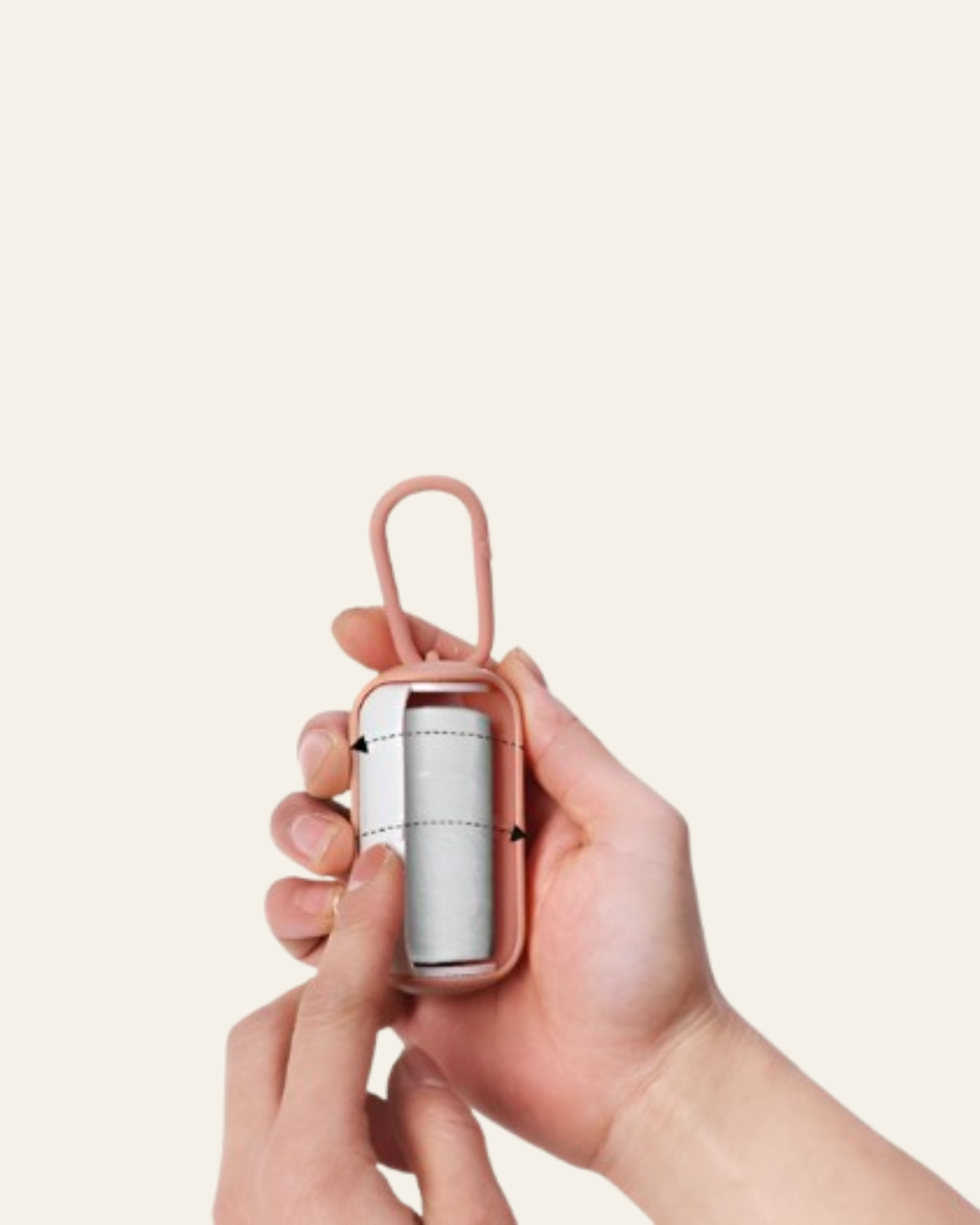 Hand holding Trailblaze Waste Capsule dog waste bag holder, close-up detail