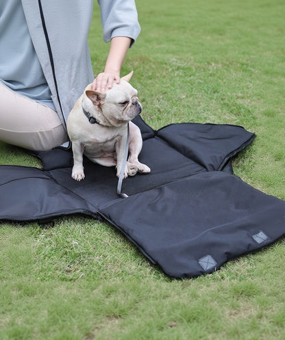 Voyager Cozy Carrier opened flat as a padded travel mat for pets outdoors