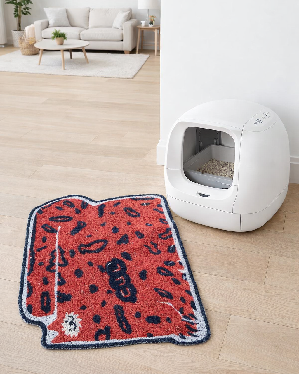 WhiskerBloom Litter Lock Mat in red style shown beside a litter box for everyday use